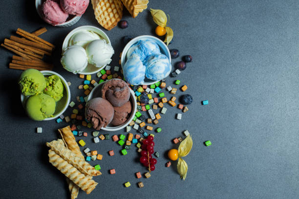 Top view Ice cream flavors in cup on blackground