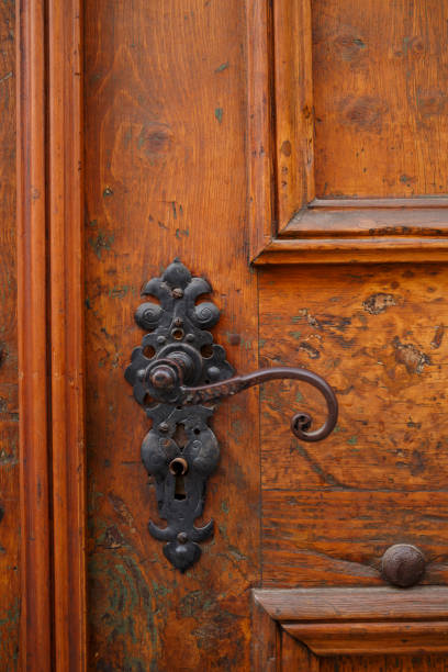 istock Old wooden door with rusty handle Architecture 660664258