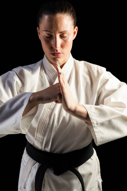 istock Female fighter performing hand salute 660667270
