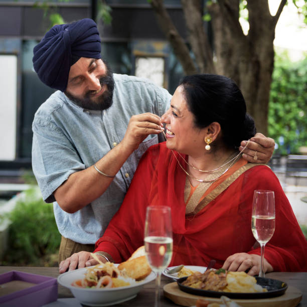 istock Indian Couple Dining Together Concept 660669776