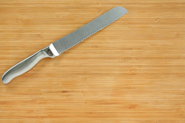 istock Steel kitchen knives on a wood board. 660669924