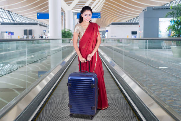 istock Woman with bag and saree clothes 660678046
