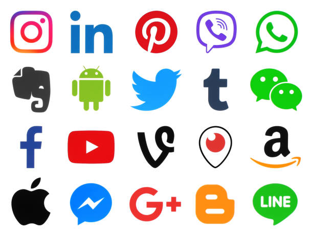 Collection of popular color social media icons Kiev: Collection of popular color social media icons printed on white paper: Facebook, Twitter, Google Plus, Instagram, Pinterest, LinkedIn, Blogger, Tumblr and others social media stock pictures, royalty-free photos & images
