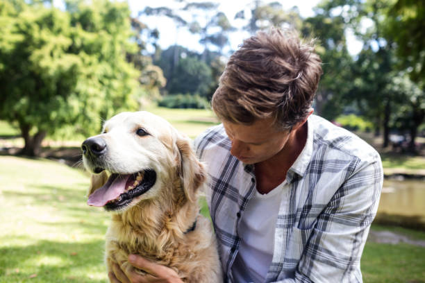 istock A Man is with his pet dog 660689938