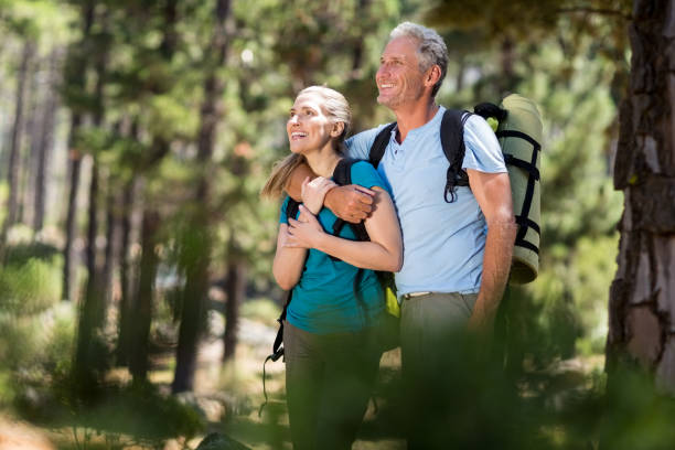 istock Couple smiling and holding each other 660704262