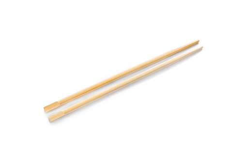 Pair of chopsticks on white background
