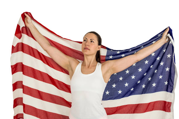 istock Female athlete posing with american flag 660718190