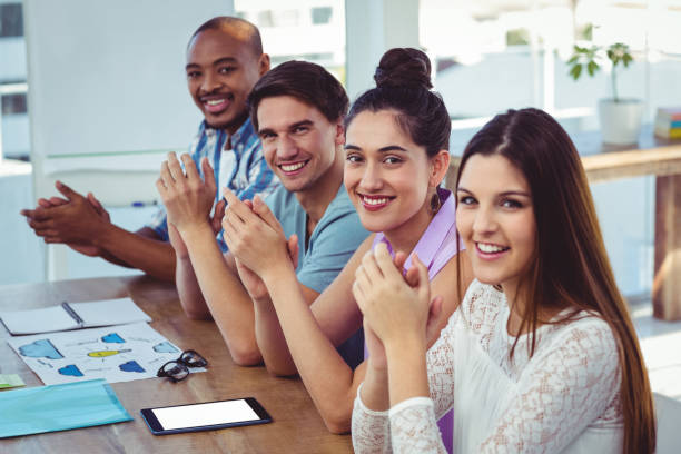 istock Creative business team at meeting applauding 660725834