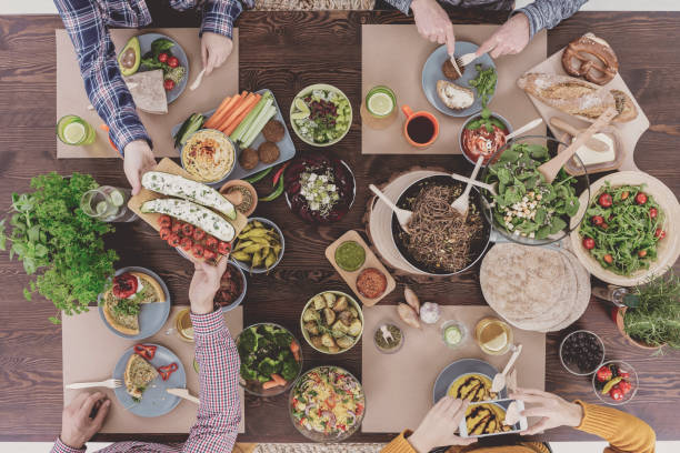 istock Friends sharing food 660729912