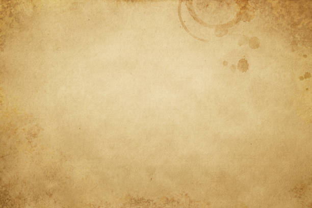 istock Old yellowed and stained paper texture. 660730156