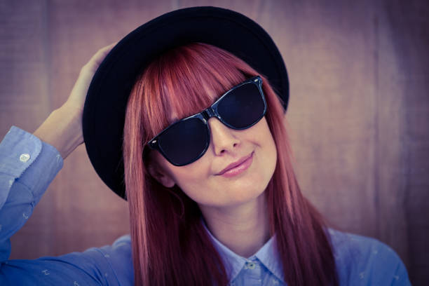 istock Smiling hipster woman posing face to the camera 660738978