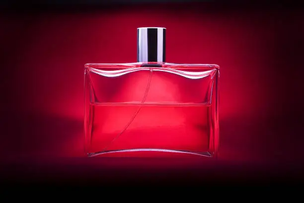 perfume bottle on a red background