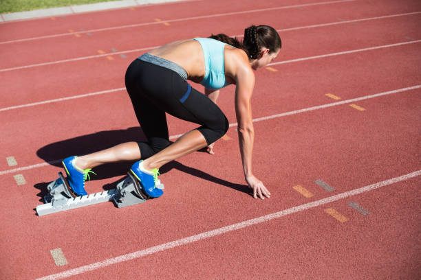 istock Female athlete ready to run 660755376