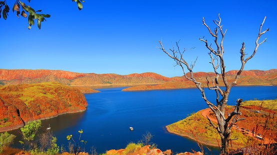 View of Lake Argyle nearby Kununurra, West Australia - this reservoir lake is full of fresh water crocodiles popular place for fishing and various family water sports