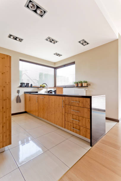 istock Bright kitchen with wooden furniture 660764274