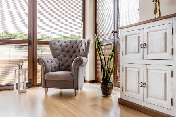 Photo of Cosy living room with comfortable armchair