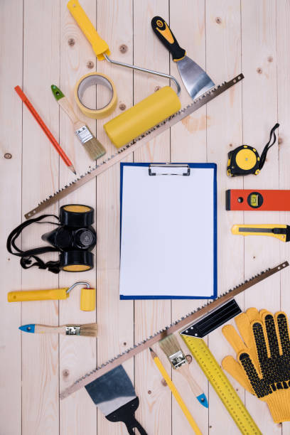 istock Top view of set of construction tools and blank clipboard 660768526