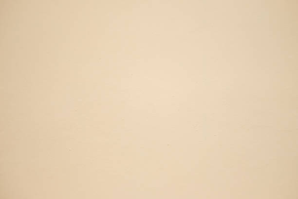 istock Texture of light cream paper for artwork. Background for design with copy space 660776298
