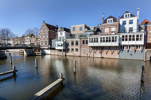Traditional canal houses and a bridge in Gorinchem in the Netherlands