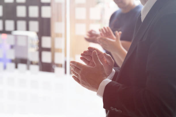 istock business people clapping hands. Business meeting seminar concept 660785240