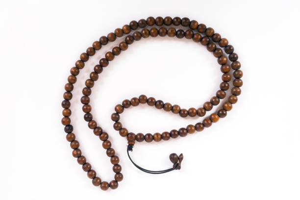 istock Wooden beads  isolated on a white 660791884