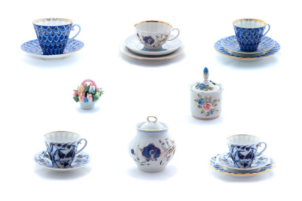 istock Collage of porcelain tea cups and dishes with flower ornament 660796572