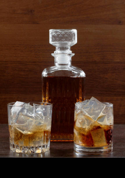 istock Glass whiskey on wood 660805242