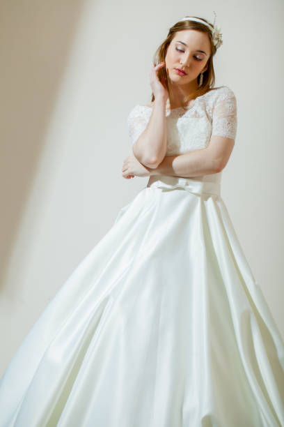 istock Beautiful young woman in wedding dressing 660805536