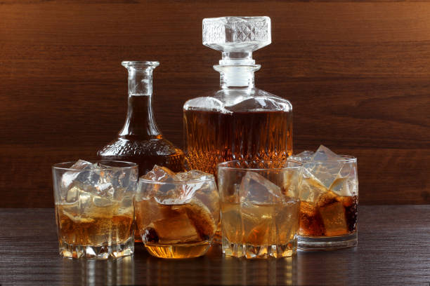 istock Glass whiskey on wood 660805618