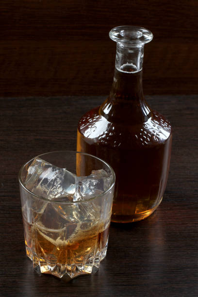 istock Glass whiskey on dark 660841258