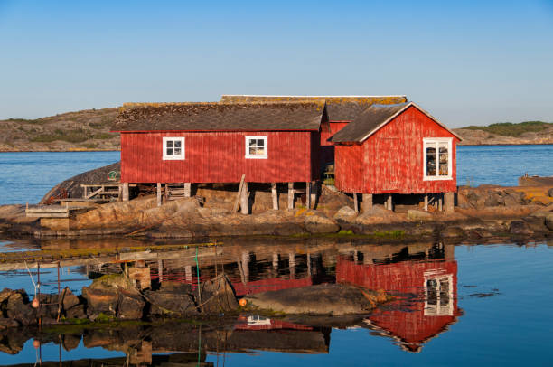 istock Small boathouses on an Bohuslan islet 660843682