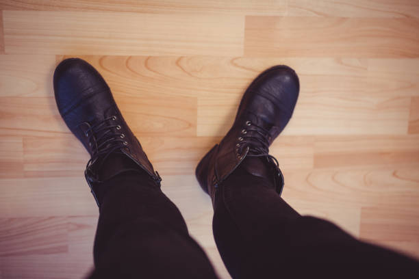 istock Cropped image of woman wearing boots 660844222