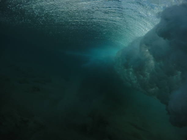 istock Underwater view of crashing wave 660848458