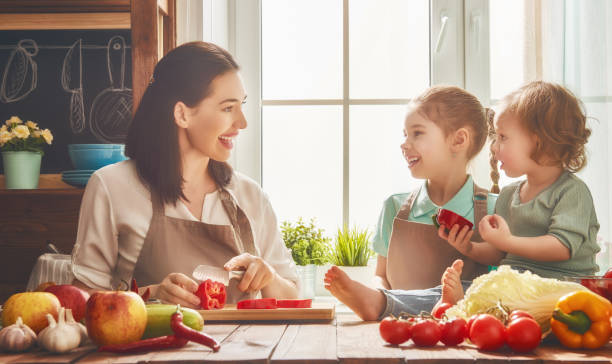 istock Happy family in the kitchen. 660849054
