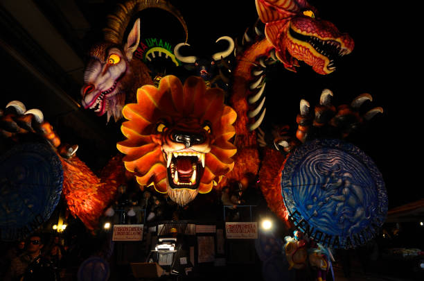 VIAREGGIO - MARCH 8: Night carnival floats parade on the promenade of Viareggio, during the famous Carnival of Viareggio on March 8, 2011 in Viareggio, Italy