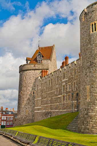 Windsor, United Kingdom - August 28, 2012: Wall and towers of Windsor Castle, which is British royal family official residence at Windsor in the English county of Berkshire