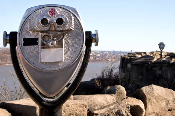 istock Binoculars on edge of cliff overlooking the Hudson River and Yonkers New York 660864950
