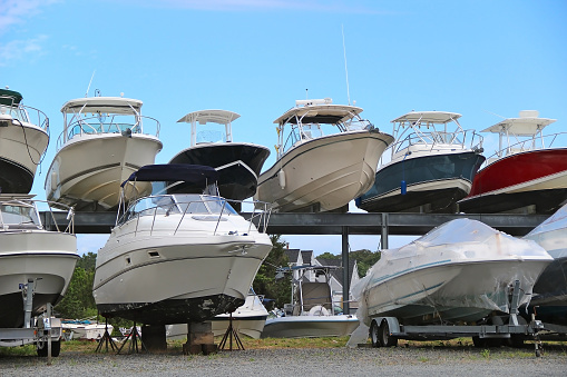 Boats and yachts stand in two rows