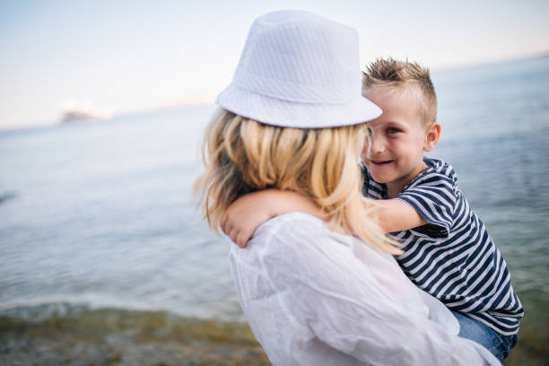 istock Mother and son by the sea 660892286