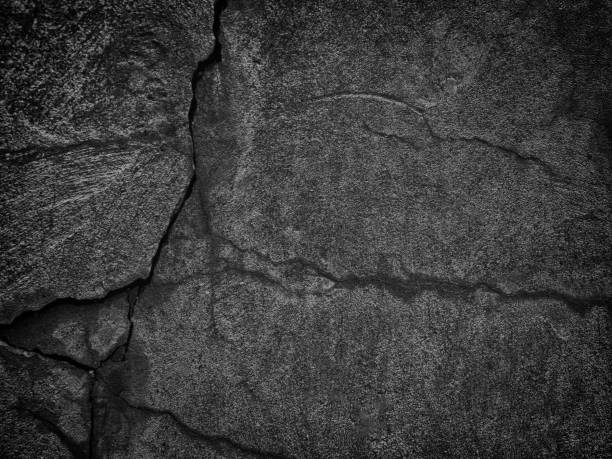 istock Black wall. Concrete surface of a dark wall 660892302
