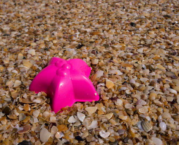istock children's toys on the beach a sunny day 660920824