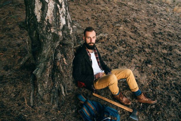 istock bearded and moustached  man in the forest. Travel style 660938688