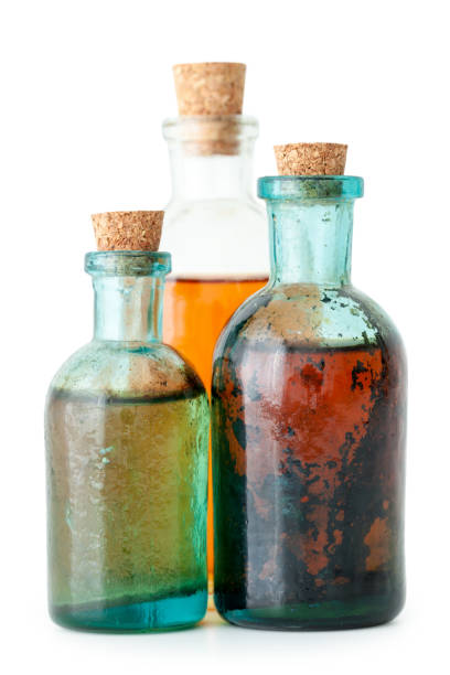 istock Three bottles of herbal infusion or essential oil on white. 660956304