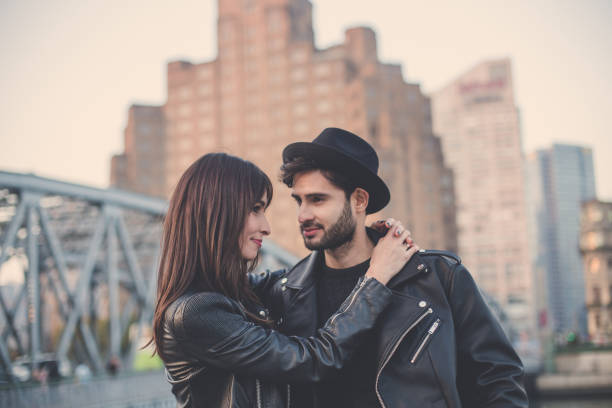 istock Couple hugging outdoors 660971512