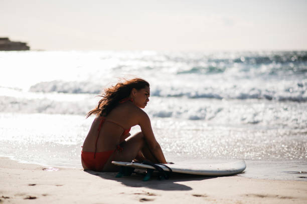 istock Woman resting at the beach 660990608