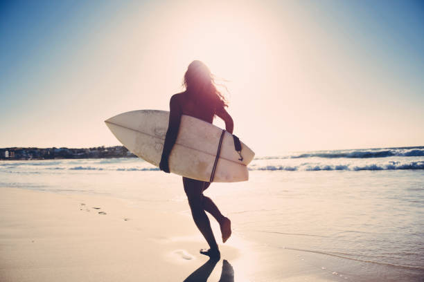 istock Girl running at the beach 660990772