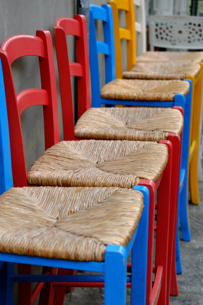 istock Colorful chairs in the old town 661014686