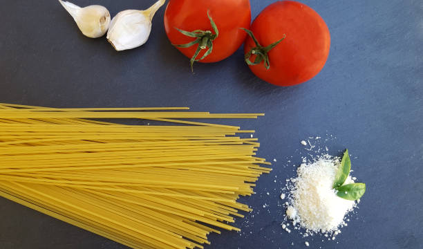 istock Ingredients for spaghetti with tomato sauce 661023020