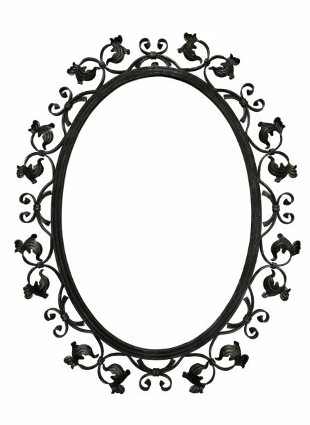 Antique iron mirror frame Antique iron mirror frame with flora decoration, isolated, ellipse photos stock pictures, royalty-free photos & images