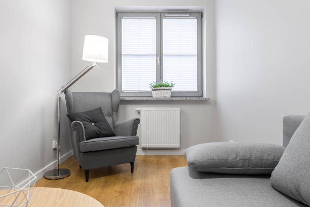 istock Living room with grey armchair 661043208